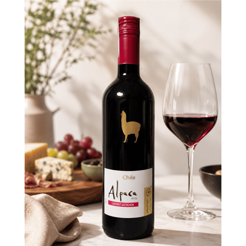Alpaca Cabernet Sauvignon 2025 Chile Red Wine 750ml bottle lifestyle table with glass