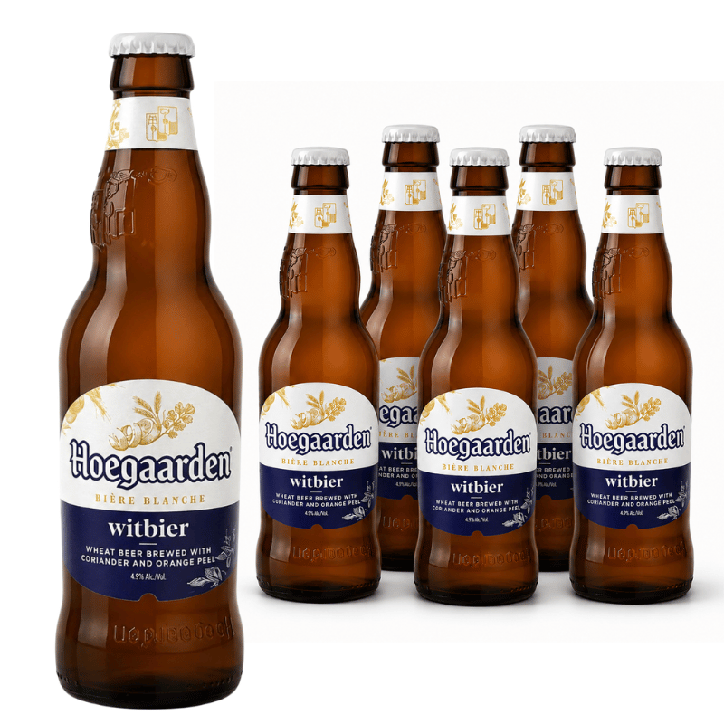 Six brown glass bottles of Hoegaarden Witbier beer arranged on a white background, with one bottle in front and five behind it.